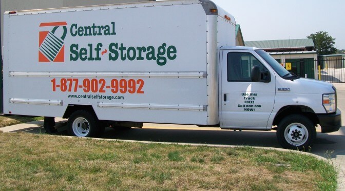 A Central Self Storage moving truck parked outside facility entrance