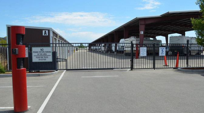 Outside secure gate entrance to outdoor storage units and covered RV parking